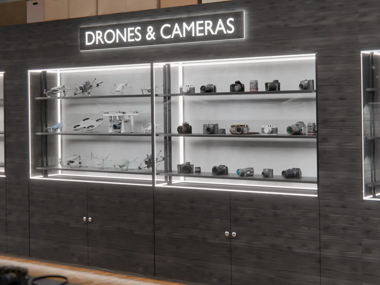 Einbausituation der LED-Lichtleiste CALLU L in Verkaufsvitrine eines Fotofachgeschäfts – präzise Produktbeleuchtung von DWD Concepts