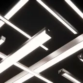 Imagebild von geometrisch angeordneten LED-Lichtleisten – modernes Lichtdesign mit klaren Linien und architektonischer Präzision